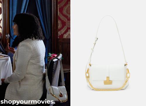 The Perfect Setting: Woman’s White Handbag