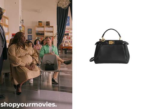 Another Simple Favor: Vicky’s Black Bag with Gold Buckle